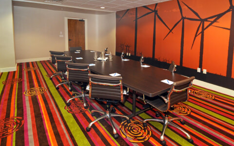 boardroom with chairs around rectangle table
