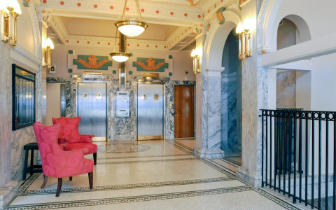 lobby with large old elevator doors