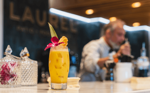 Laurel Restaurant cocktail with a garnish 