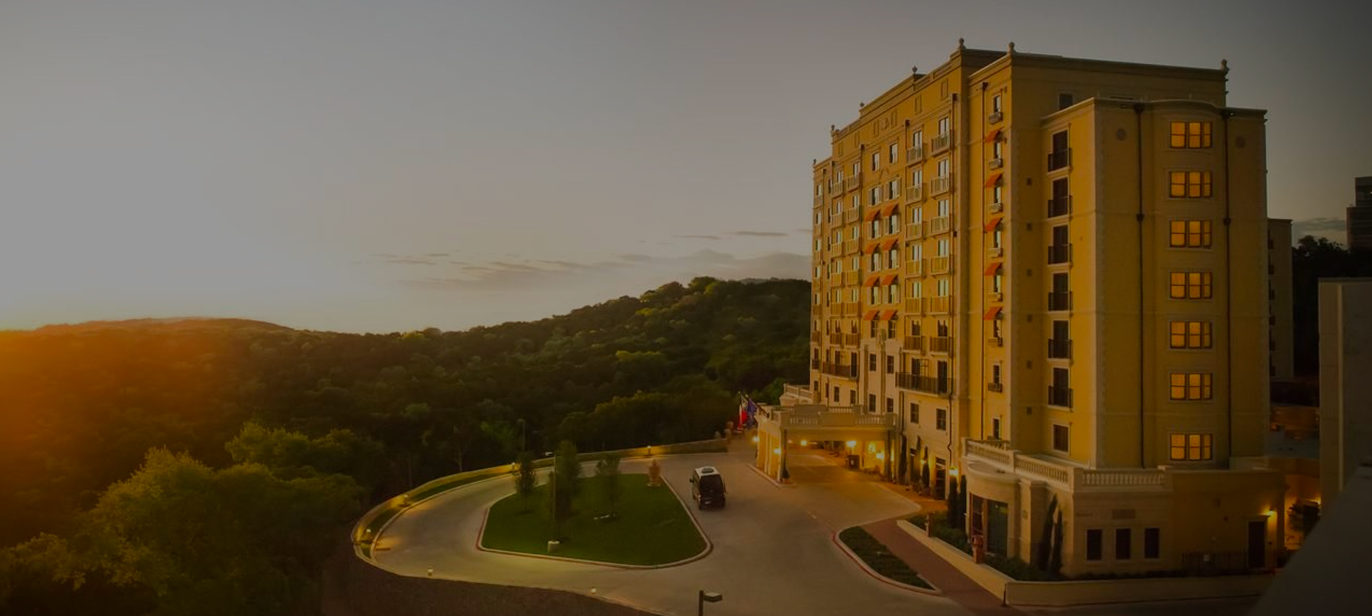 exterior view of hotel viata at sunset