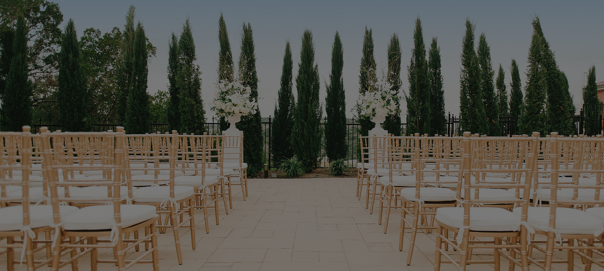 chairs set up outside for a wedding ceremony
