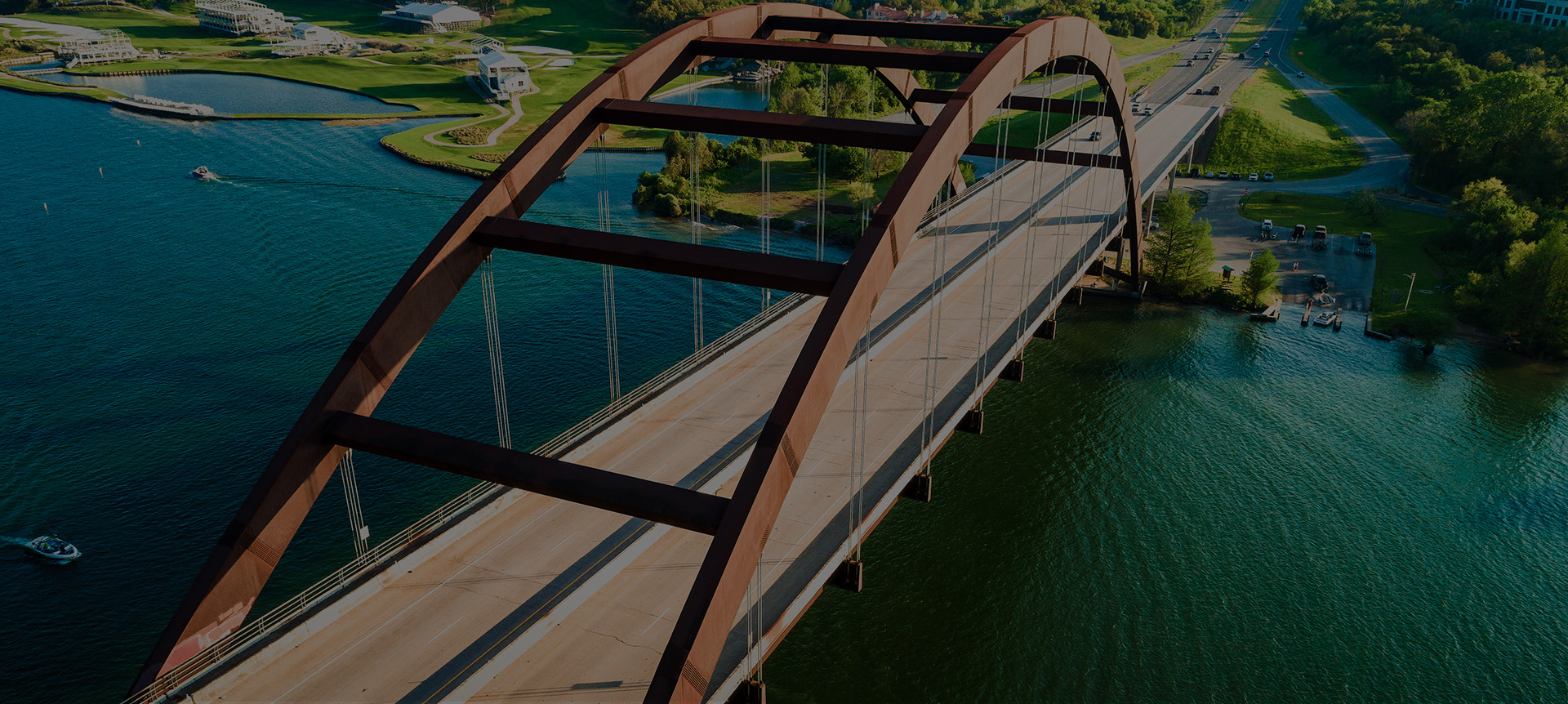 over-looking view of a bridge over the water in Austin