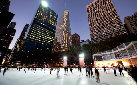 view of the rink at rockefeller center during nightime