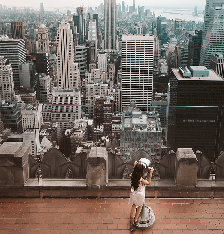 aerial view of woman sightseeing the city