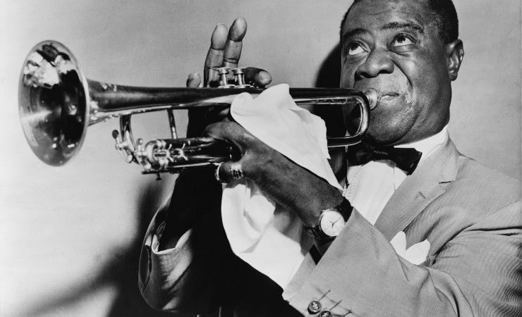 Louis Armstrong playing trumpet