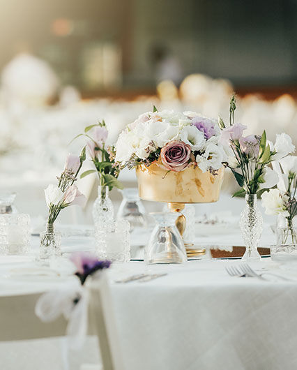 detail shot of a banquet table with floral centerpiece 