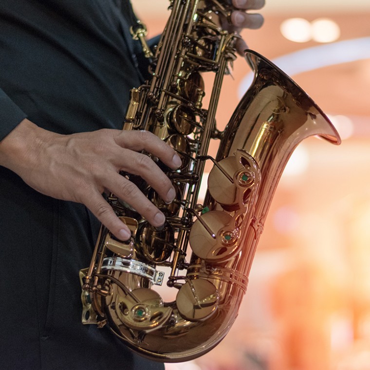 Close up of man playing saxophone