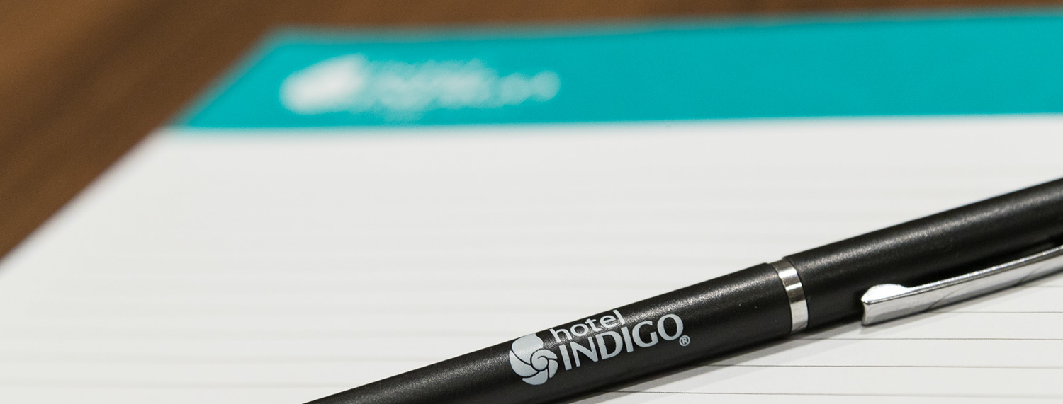 Close up of pen on top of notepad