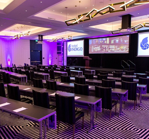 Internal view of a big meetings room with neon lights