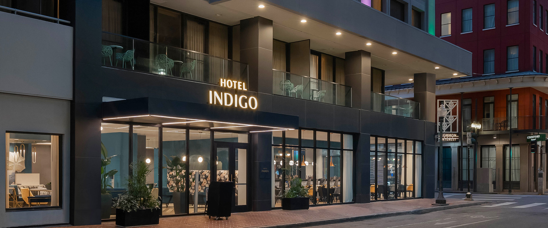 image of the outside of hotel indigo at night