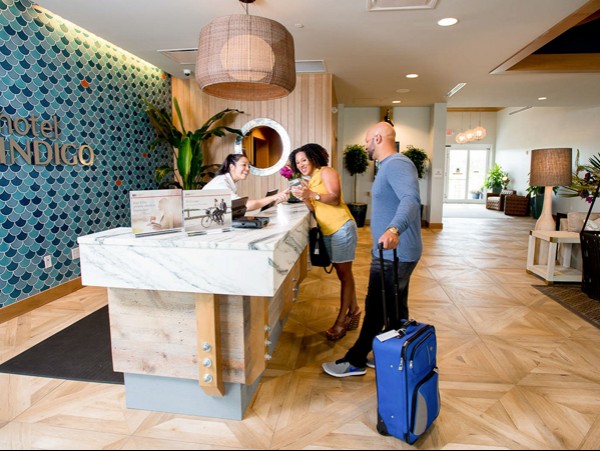 couple checking in at the front desk
