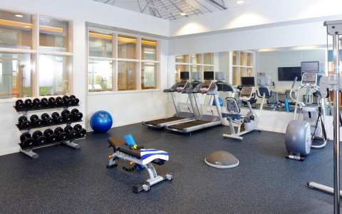fitness center area with weights and machines