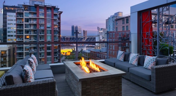 rooftop lounge area with fireplace