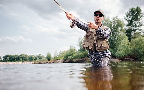 man fly fishing