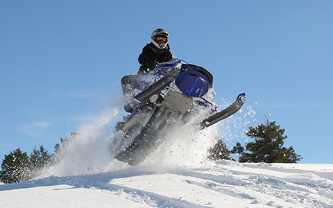 snow mobile in air