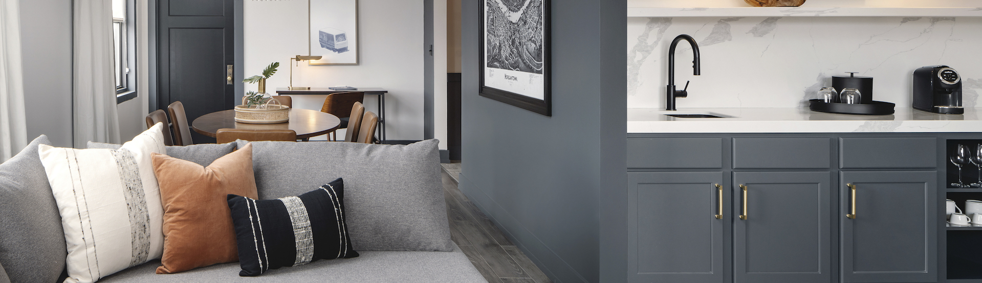 guest room with kitchenette, living and dining area
