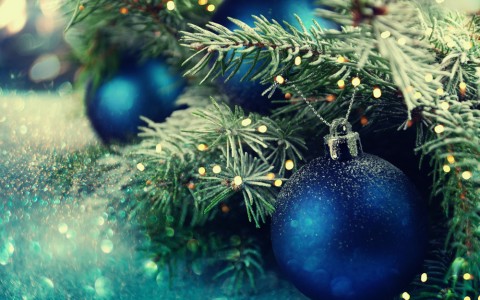 blue ornaments on christmas tree