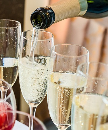 Champagne being poured into glasses