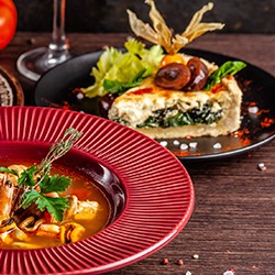soup and baked tortilla on plates