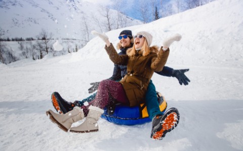 couple tubing in snow