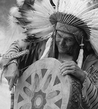 Native American Man Drumming