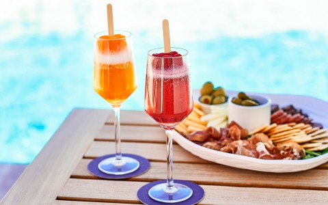 cocktails and appetizers by the pool