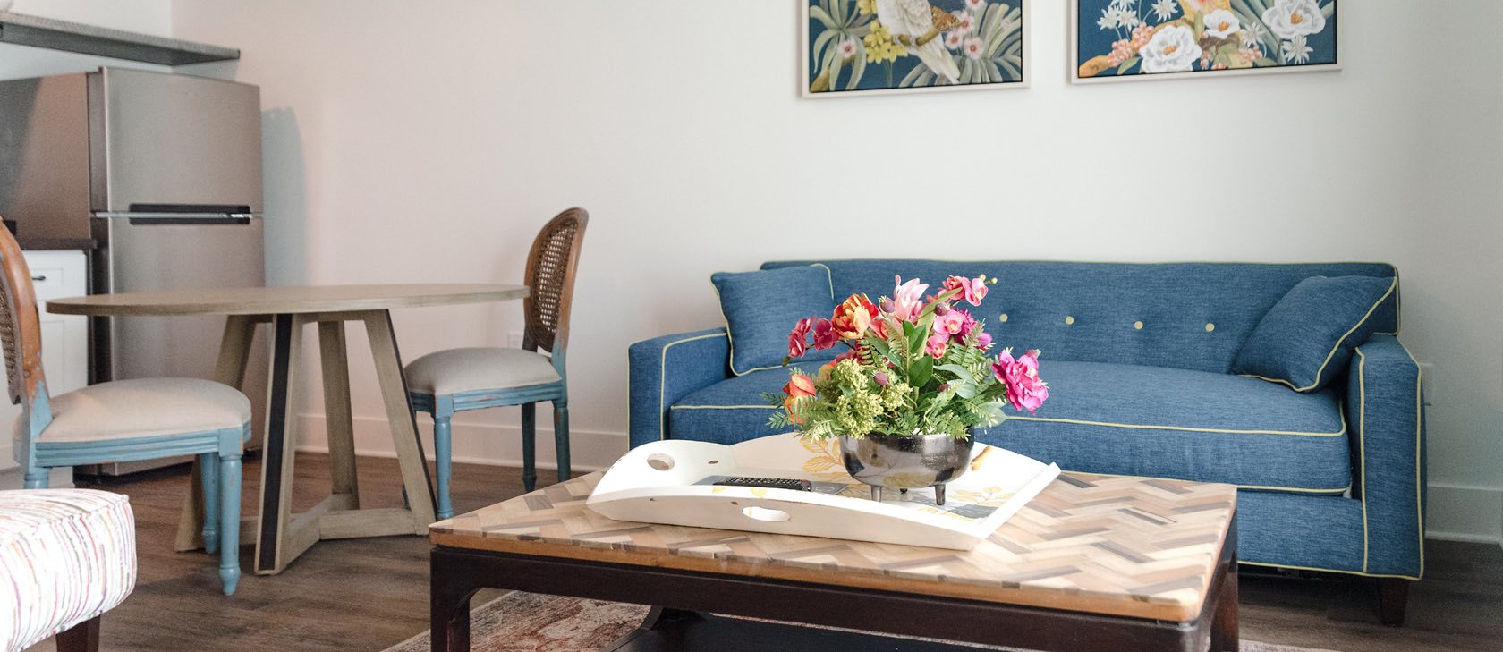 hotel suite sitting area with a small dining table