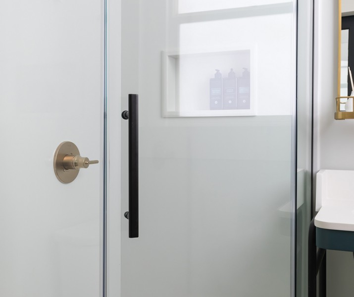 Stratford twin guest bathroom glass shower door with black handle