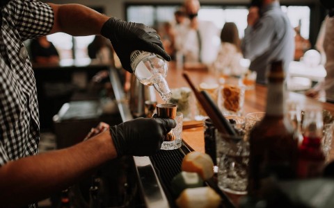 bartender serving drinks 