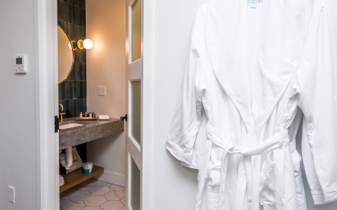bathroom with robe hanging 