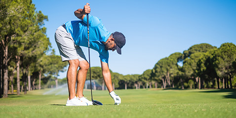 guy playing golf at the course golf