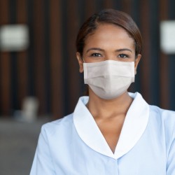 female housekeeper with mask