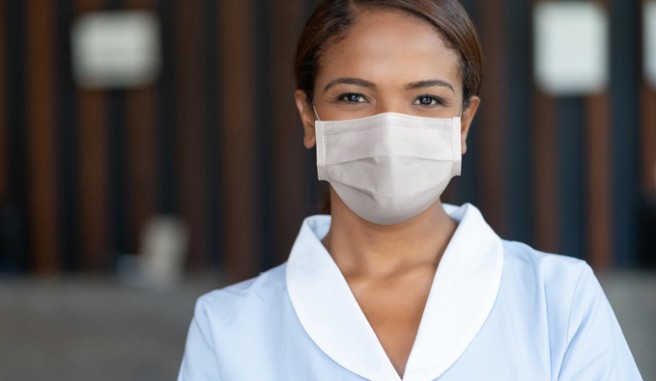 female housekeeper with mask