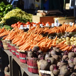 farmers market with fresh vegetables on display