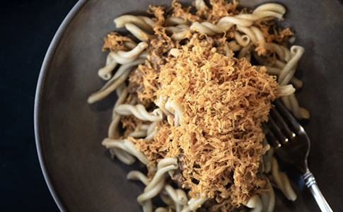 zoomed view of an elegant plate of pasta
