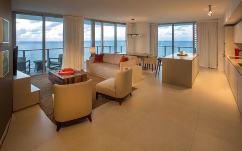 Deluxe Oceanfront at Hyde Hollywood Beach has full sitting area and floor to ceiling sliding doors on a a number of walls with ocean views