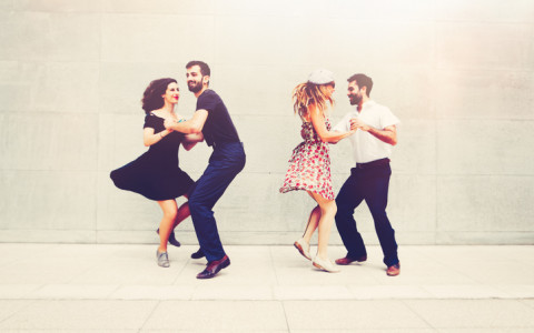two couples dancing