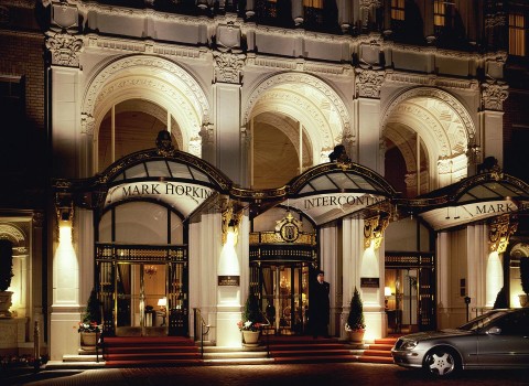 the exterior of the mark hopkins at night