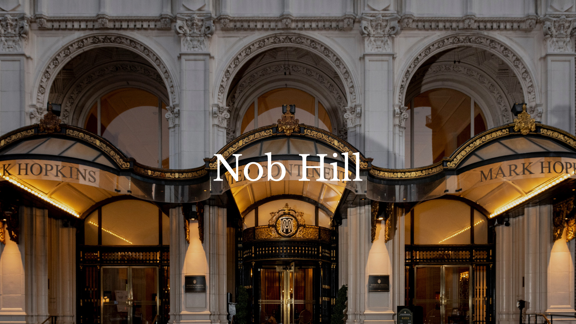 Exterior shot of the san francisco mark hopkins hotel with a "Nob Hill" text on top of the image 