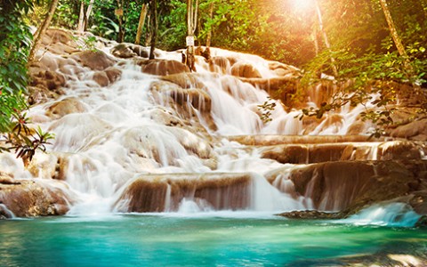 Water cascading down stones in a river.