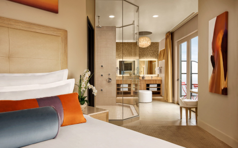 suite with glass shower