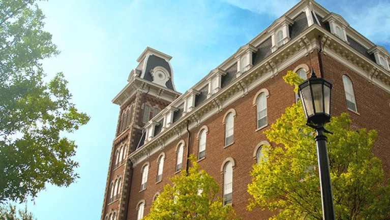 Begin your tour of the University of Arkansas from Fayetteville's best view: the lawn of Old Main