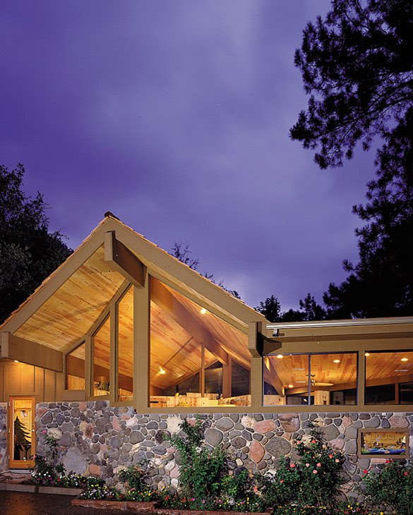 exterior of modern cabin with large windows