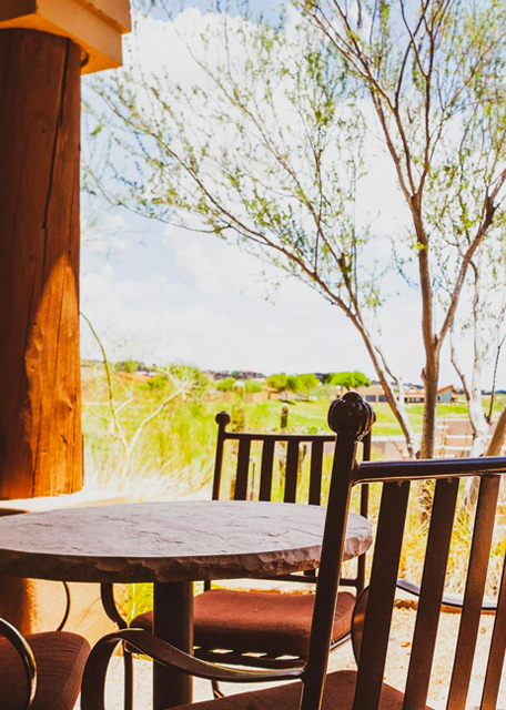 small round table with a view of gold courses