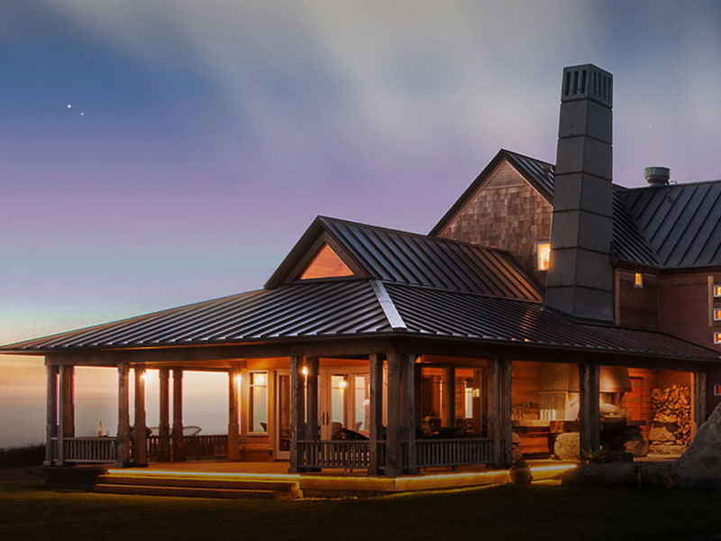 hotel building during sunset with lights on