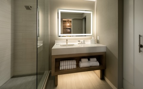 a guest bathroom with one vanity