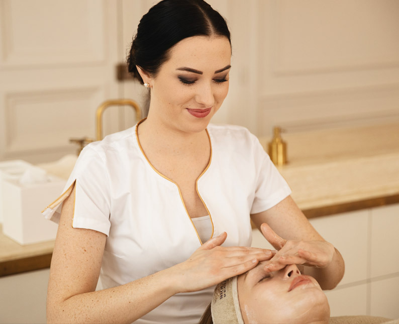 women getting a facial massage