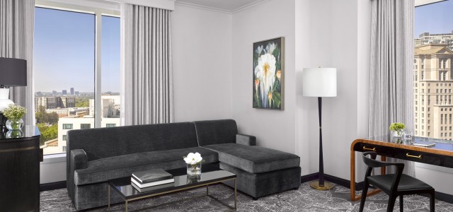 living room area in a suite with grey accent patterns