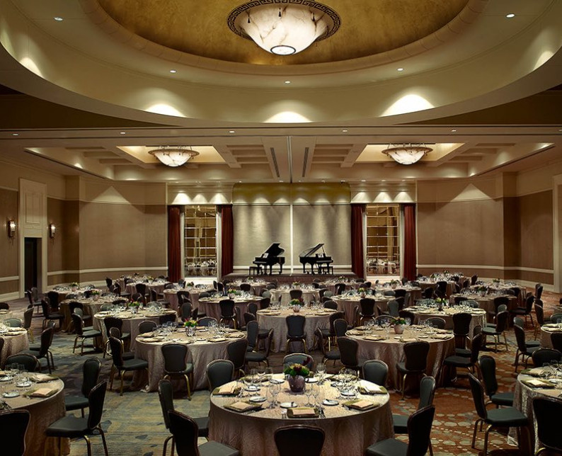 windsor ballroom arranged with large round tables and chairs under a dome ceiling
