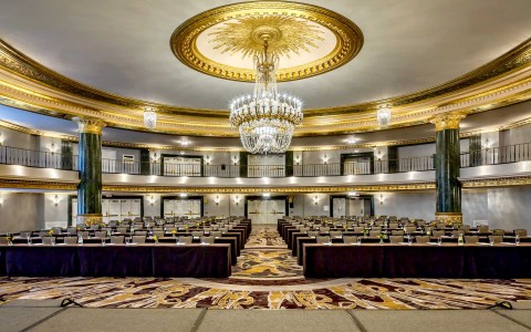 large meeting space with a huge chandelier